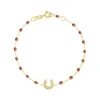 Bracelet fauve Fer à cheval, diamants, or jaune, 17 cm