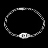 Bracelet Menottes dinh van R10 or blanc et diamants