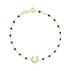 Bracelet noir Fer à cheval, diamants, or jaune, 17 cm