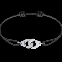 Bracelet sur cordon Menottes dinh van R12 or blanc