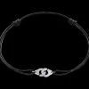 Bracelet sur cordon Menottes dinh van R8 or blanc