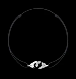 Bracelet sur cordon Menottes dinh van R10 or blanc et diamants