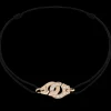 Bracelet sur cordon Menottes dinh van R8 or rose et diamants