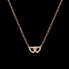 Collier Double Cœurs R9 or rose et diamants