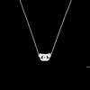 Collier Menottes dinh van R8 or blanc