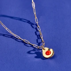 Pendentif Menottes dinh van R10 Corail or jaune et corail