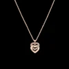 Pendentif sur chaîne Double Cœurs R10, OR + 1/2 DIAS